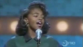 Screenshot of Lauryn Hill performing at the Apollo Theater
